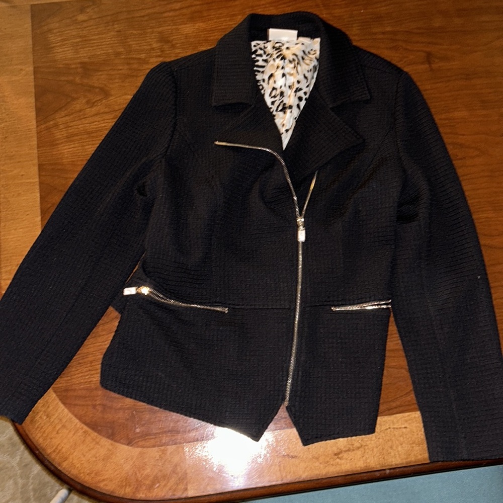 68 % polyester 32% cotton.  In excellent condition
